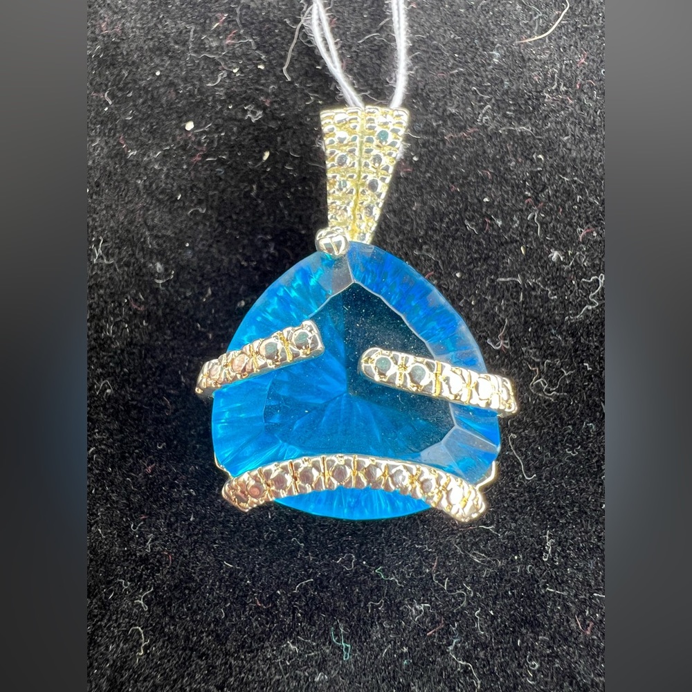 Large blue stone pendant wrapped in 925 Sterling silver. Not contain a chain.